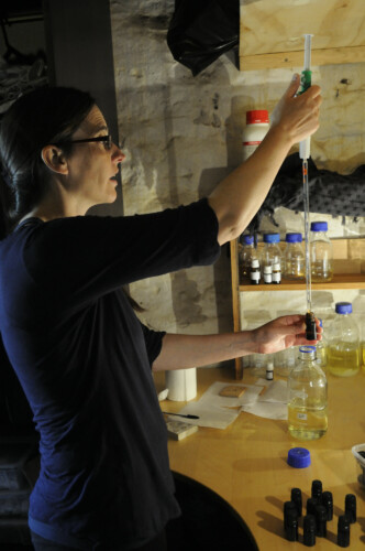 filling the bottles with precision